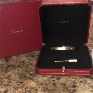 Cartier love bracelet used. With key, box & cert